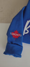 Load and play video in Gallery viewer, Blue Jays Glitter Sweater
